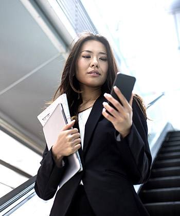 businesswoman checking her smartphone