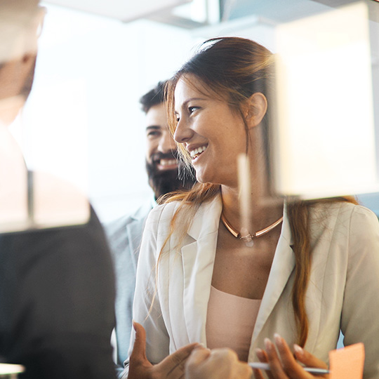 woman smiling in meeting